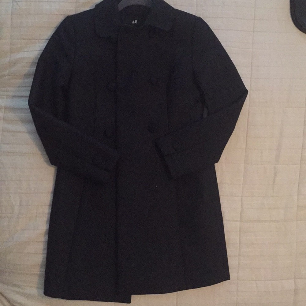 Black long, button down trench coat.